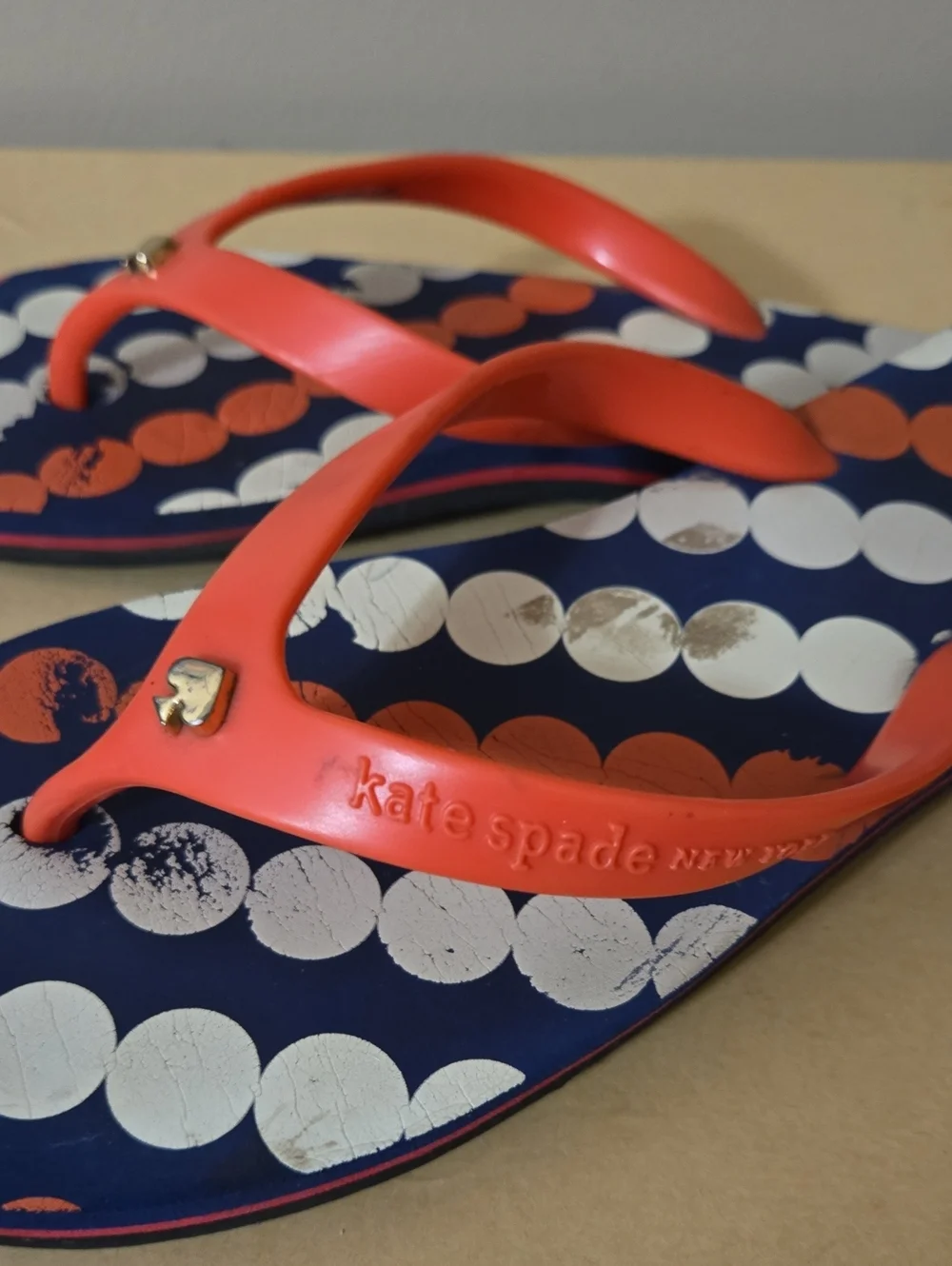 kate spade navy flip flops with white and coral polka dots Size 10M